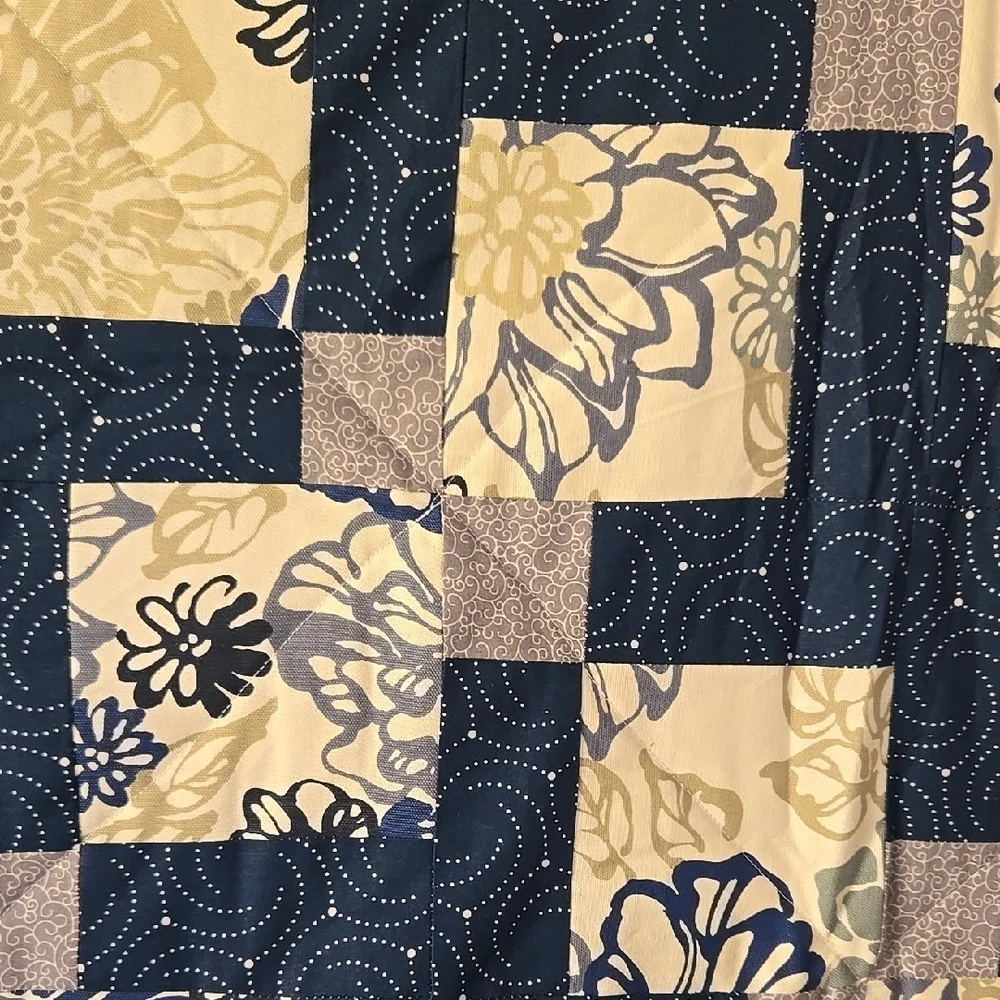 Cream and Blue Patchwork Quilt with Geometric Design